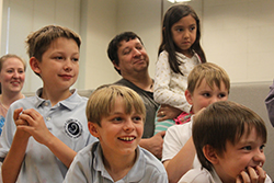 OLV students react to their classmates testing out some of the technologies in the DATA lab.